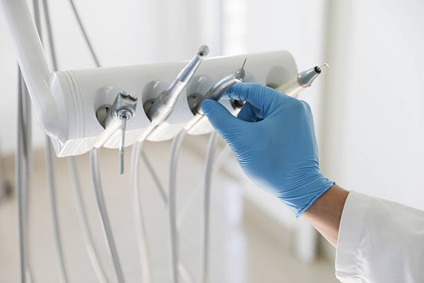 Professional Tooth Extraction technician working in Victoria, KS